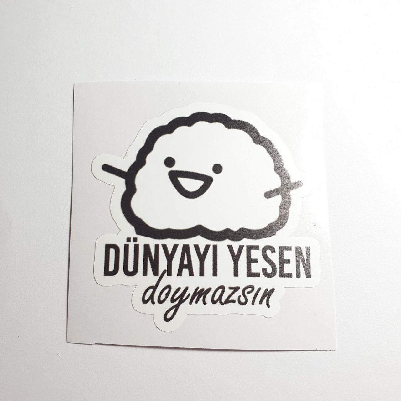 Dünyayı Yesen Doymazsın Sticker